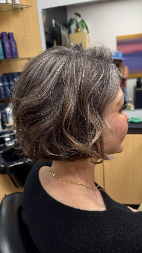 soft dimensional gray blending on short wavy hair by Oklahoma City Goldwell Master Colorist Jennifer Bass Billman