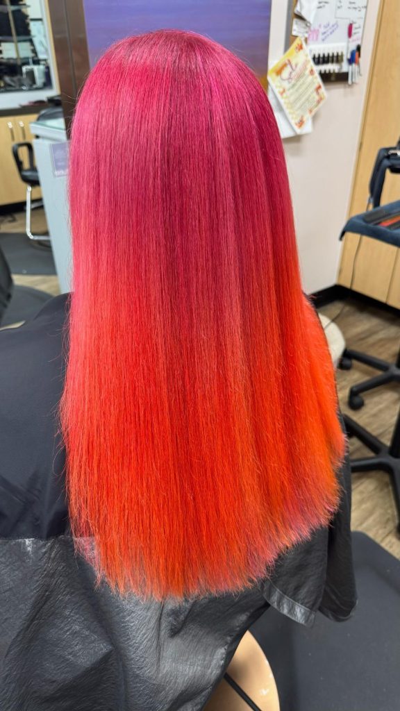 straight vivid pink to orange ombre hair color transformation in Oklahoma City