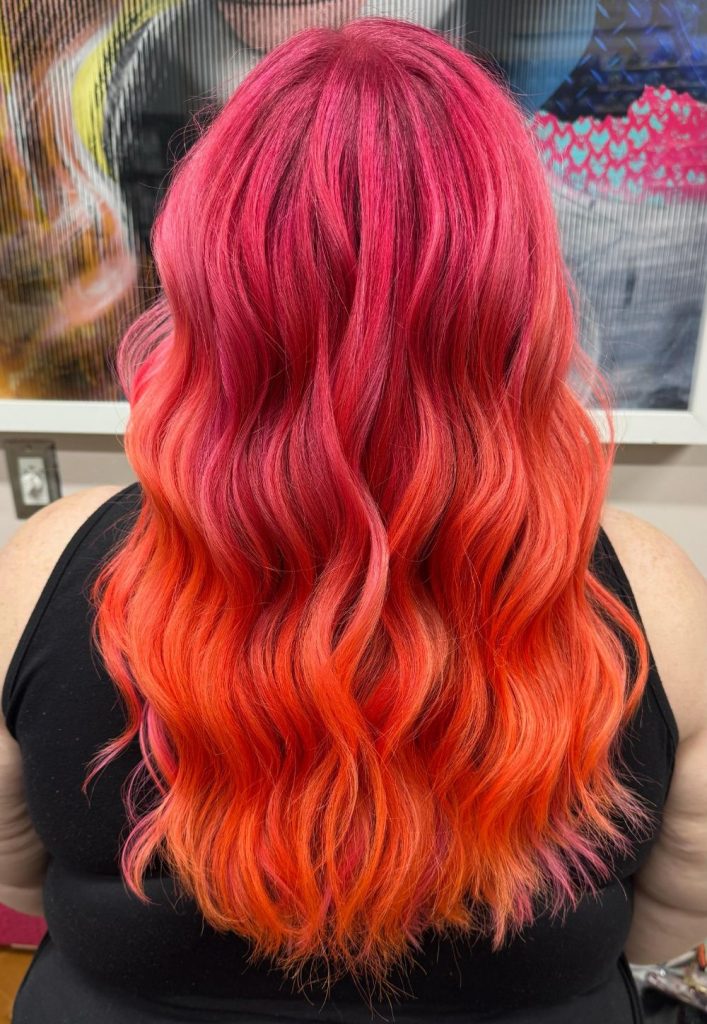 full head pink to orange wavy sunset melt hair color by Jennifer Bass Billman Oklahoma City